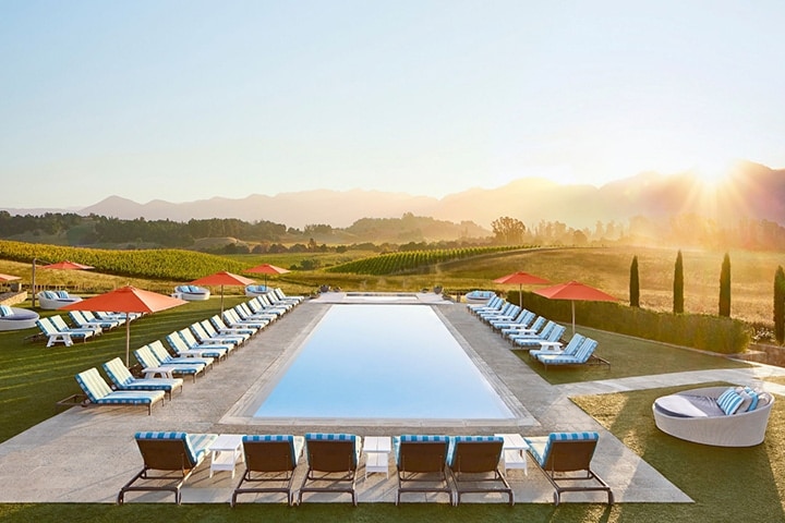 Pool surrounded by chairs at the Carneros Resort