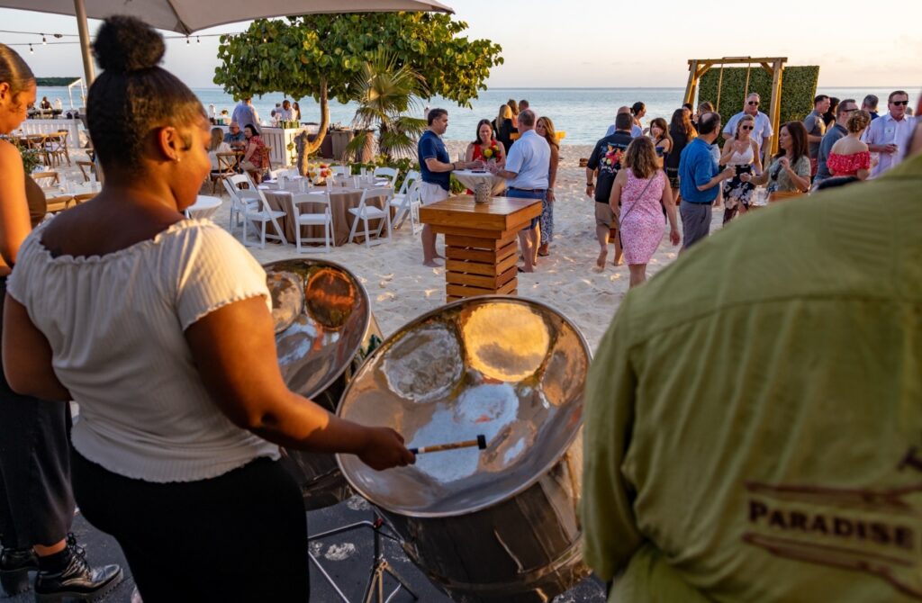 Drums being played as entertainment at a beach gathering