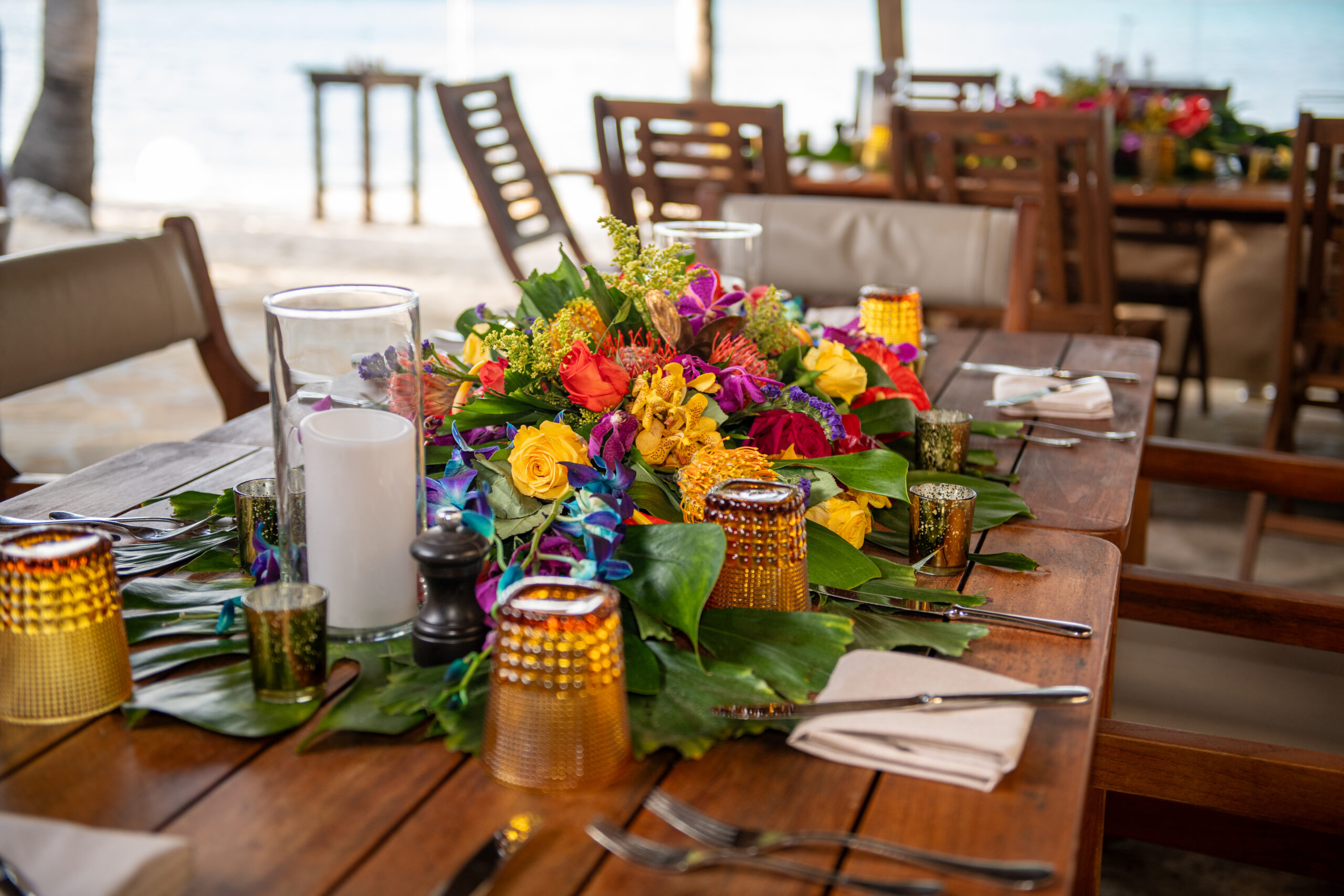table-with-flowers-set-on-beach-in-Virgin-Gorda